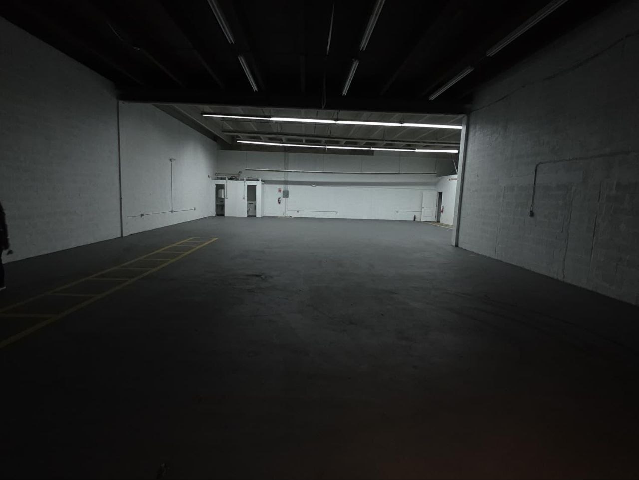 Empty warehouse storage space with high ceilings in Plantation, FL